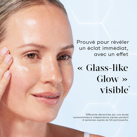 Woman applying skincare product with text about 'Glass-like Glow' effect on a light blue background-hover-49